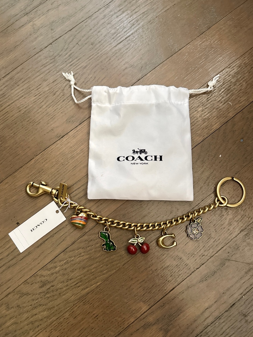 NWT Coach Motif brass Charm Keychain w/pouch